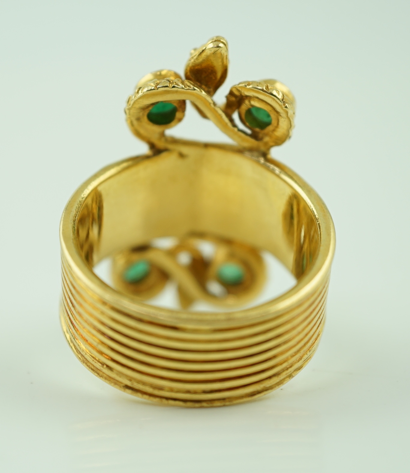 A Ilias Lalaounis 18k gold and four stone emerald set dress ring